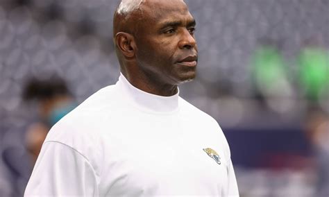 jags assistant charlie strong usf hit with penalties from ncaa