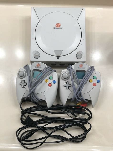 Sega Dreamcast White Console With 2 Controllers And Memory Cards