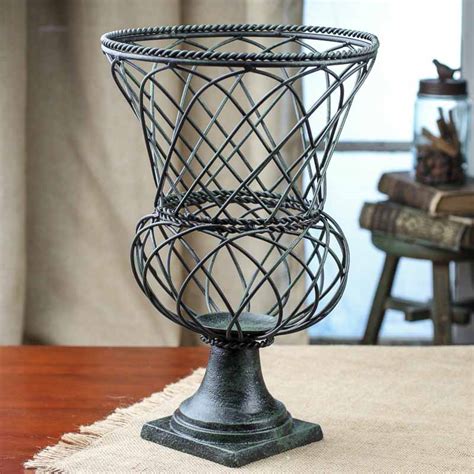 Perhaps you would like to burn pillar candles outside or in an environment where they need to be contained. Black and Green Wired Pedestal Pillar Candle Holder ...