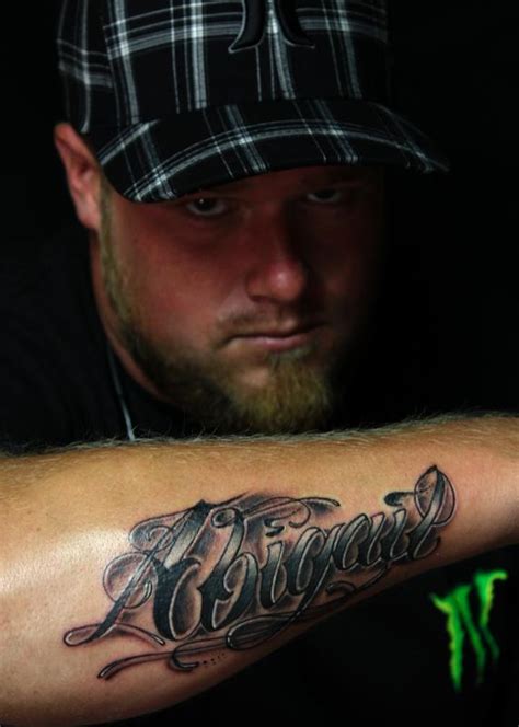 'your name' tattoo on his right buttock. Daughters name. by Steve Phipps : Tattoos