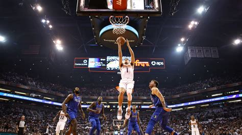 Devin booker of the phoenix suns handles the ball during the game against the boston celtics on february 7, 2021 at talking stick resort arena in. Devin Booker powers Suns' victory over Mavericks in season ...
