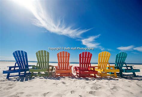 Find new adirondack chairs for your home at joss & main. Colorful row of Adirondack chairs on the beach - Stock ...