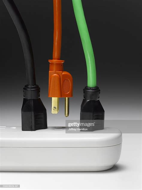 Extension Cords Plugged Into Extension Socket One About To Connect High