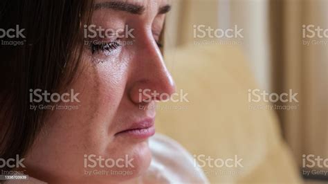 Closeup Of A Crying Woman Blurry Mascara Dripping Down Her Cheeks Stock