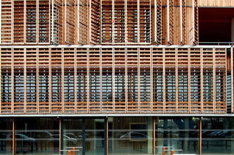 Wooden Louvered Shutters On A University Building 493