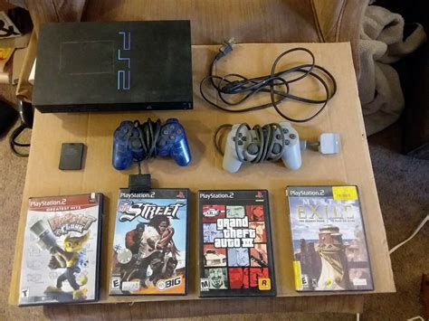 Sony Playstation2 Stout Ps2 Bundle With 5 Video Games Icommerce On Web