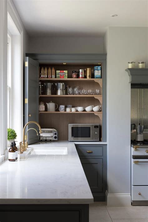 These mountable ovens are designed to fit unobtrusively under the counter while freeing up space for other kitchen essentials. Microwave inside the cabinet + toaster in the cabinet ...