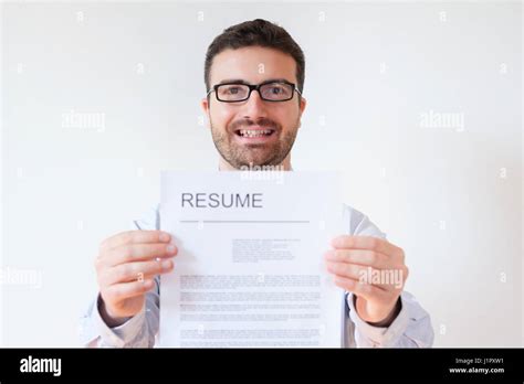 Man with resume and work career ready to find a job Stock Photo - Alamy