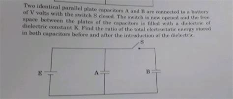 The Figure Shows Two Identical Parallel Plate Capacitors Connected To A Battery With The Switch