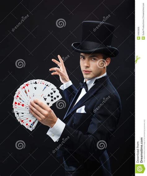 Within the card game context, the magician is the lowest trump card, also known as the atouts or honours.in the occult context, the trump cards. Magician Showing Trick With Playing Cards Royalty Free Stock Image - Image: 34953606