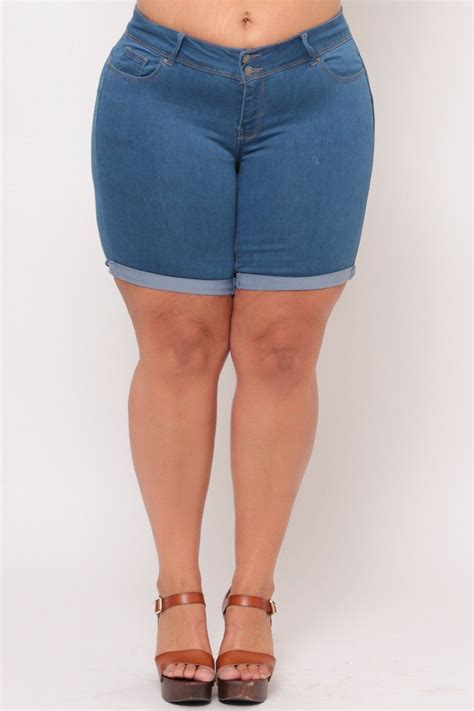 This Plus Size Stretchy Jean Short Features A Medium Wash With A Zip Fly With Button Closure