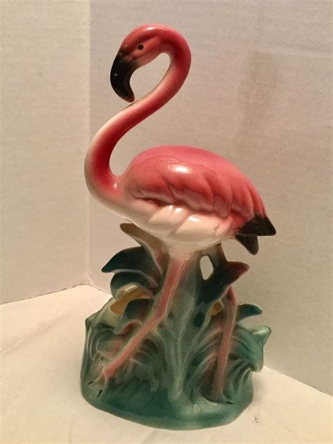 This pink flamingo planter gives a garden or yard a fun pop of color a full 3 feet tall, this outdoor planter features a charming sculpture of a pink flamingo with stakes included to insert into holes at base so item is secure in the soil. VINTAGE PINK FLAMINGO POTTERY PLANTER | Pottery planters ...