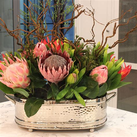 We Just Love Our Stunning Mixed Protea Arrangement Place It In The