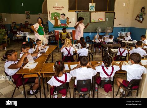 Children At School In Trinidad The Lovely City In Cuba While They Are
