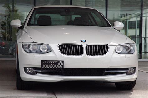 I'm in ny, haven't mounted my front plate yet, and not one cop has people that have a center mounted, dealer drilled license plate that relocate it to the two hook, and then buy some aftermarket plate to cover the holes. BMW Front License Plate Bracket Mount No-Drill Tow-Hook | eBay