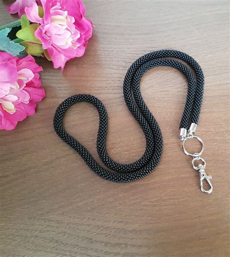 You'll find dozens of id badge holders and retractable options, too. Black beaded crochet rope lanyard, ID holder, ID badge ...