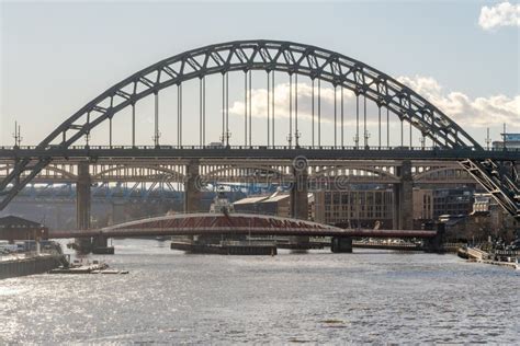The Tyne Bridge Crossing The River To Gateshead With Aligned Bridge