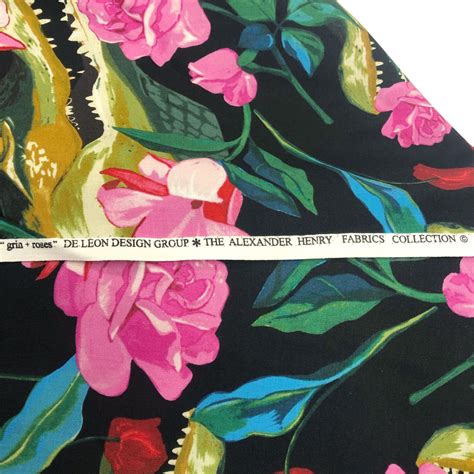 alexander henry grin and roses black cotton fabric crocodiles fabric and frolic
