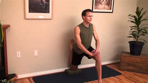 Yoga Pose Quadricep Thigh Stretch Against The Wall