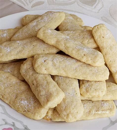 During cooking, the air bubbles expand by inflating the cookies, which thus take on the typical foamy consistency. Eggless (Egg Free) Savoiardi or Lady Fingers Biscuits ...