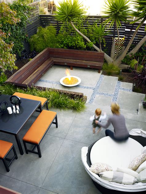 Design ideas for a small traditional shade backyard stone landscaping in london. Is your yard or garden small on space? Get big ideas for ...