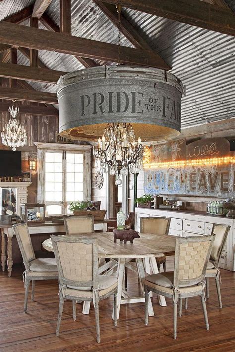 The Dining Room Table Is Surrounded By Chairs And Chandelier
