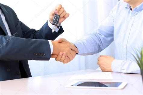 This will also give you an opportunity to provide nuance and. Car salesman handing over the keys for a new car to a ...