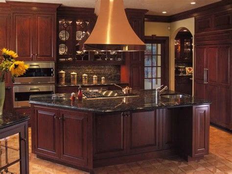 Kitchens with black granite countertop surfaces are trending as beautiful and has a sleek and stylish look. Get Cherry Kitchen Cabinets With Black Granite Countertops ...