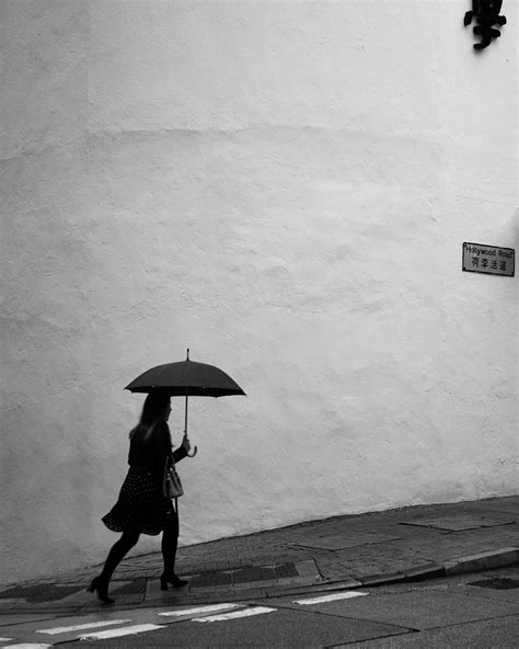 rainy day ☔️ a girl walk alone at street in rainy day in h… flickr