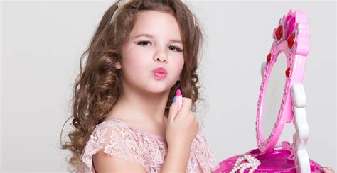 Cute Little Girl With Lipstick Applying Makeup Glamour Kid Beating