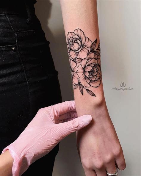 Flower wrist tattoos remain a popular choice for many reasons. Flower tattoo for your wrist #tattoosforwomensexys ...