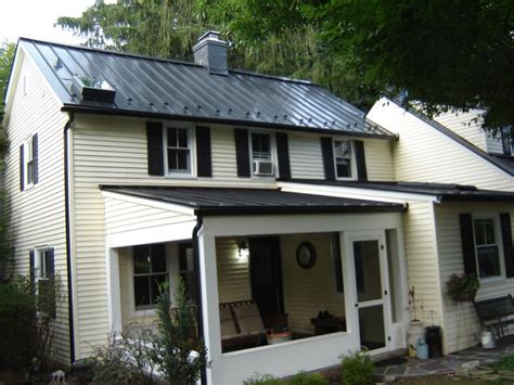 It is a softer and less drastic color than a typical black roof.dark bronze ha. Matte Black Standing Seam Metal Roof | Black metal roof, Architectural shingles roof, Metal roof ...