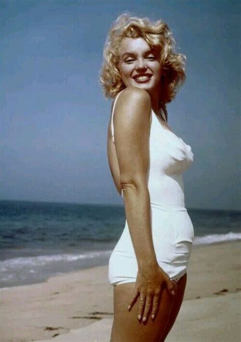 Marilyn Monroe In A White Swimsuit During Her Famous First Photoshoots