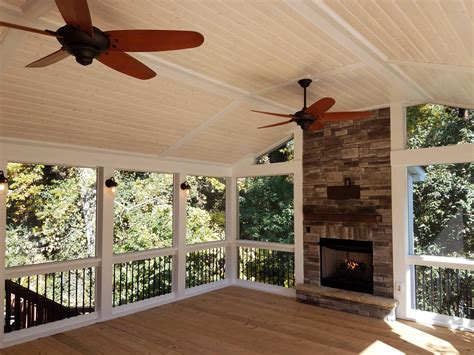 Screened Porch With Fireplace And Wall Sconces — Deckscapes