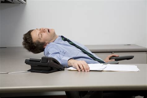 Person Sleeping At Desk