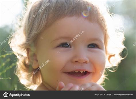 Kids Portrait Close Up Head Of Cute Child Baby Smiling Cute Smile On
