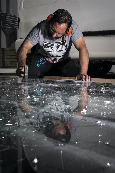 Artist Simon Berger Creates Portraits Using Shattered Glass Art