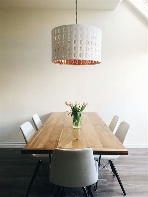 Check spelling or type a new query. Minimalist dining room with IKEA pendant light in copper ...