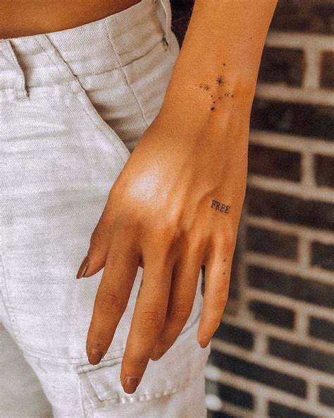 Stunning pink rose hand tattoos. Search inspiration for a Minimal tattoo. in 2020 | Dainty ...