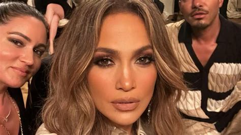 jennifer lopez goes braless to flaunt her chiseled abs as rumors swirl about her marriage to ben