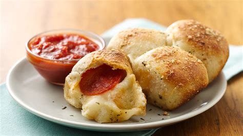 Ingredients 1 can (8 oz) refrigerated pillsbury™ original crescent rolls (8 count) or 1 can (8 oz) refrigerated pillsbury™ original crescent dough sheet 2 tablespoons grated parmesan cheese 1/3 cup finely chopped pepperoni (about 1 1/2 oz) Stuffed Crust Pizza Snacks Recipe - Pillsbury.com