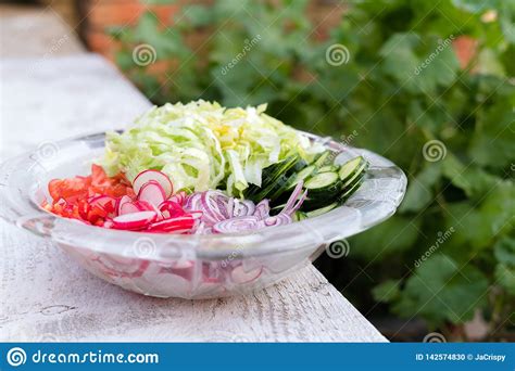 Freshly Chopped Summer Salad Many Delicious Vegetables In Glass Salad
