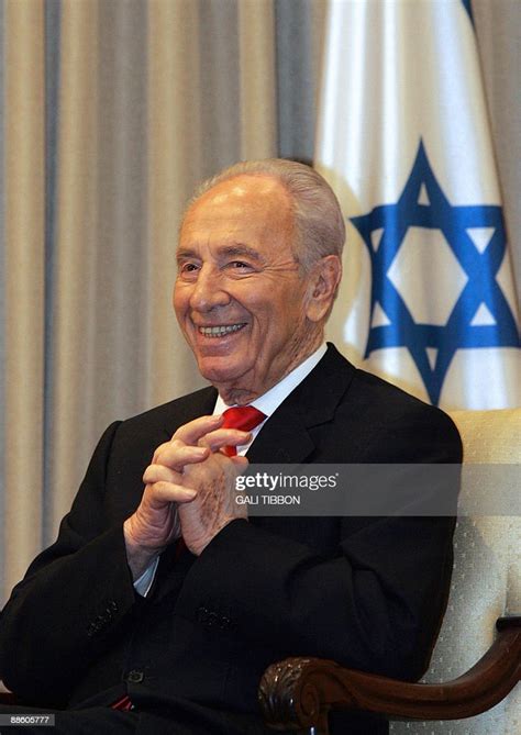 Israeli President Shimon Peres Smiles During An Official Meeting At