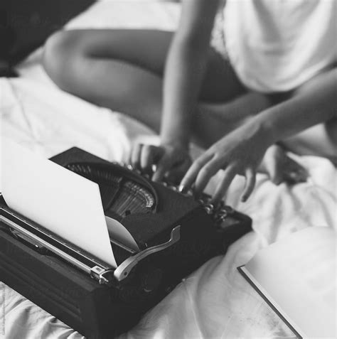 Woman Typing On A Typewriter By Stocksy Contributor Guille Faingold Stocksy