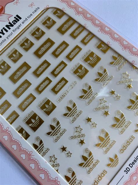 Shop nail art stickers that cover your entire nail! Sports themed nail art stickers decals . Gold adidas ...