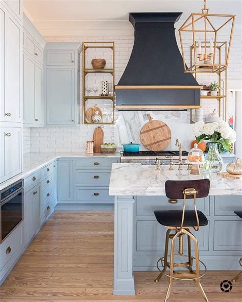 When asked to design this new home, the very talented interior designer rita chan, from rita chan interiors, knew she would have to design a kitchen that i hope you like the kitchen as much as i did! Light Blue Paint, Marble and Brass Kitchen Design ...