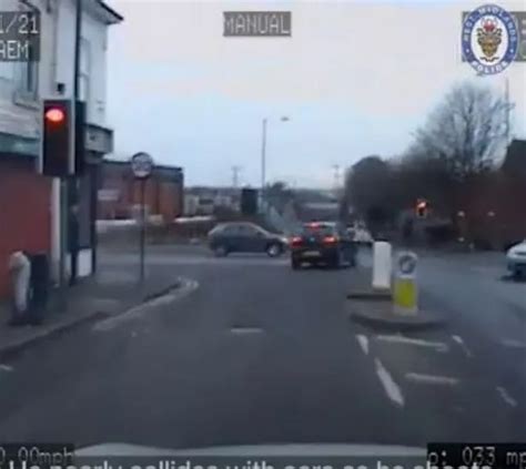 watch police pin crazed driver against tree after 80mph chase through busy city streets