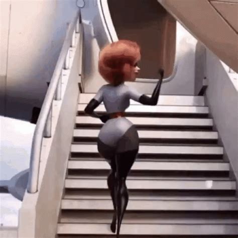 A Woman With Red Hair Is Walking Down Some Stairs