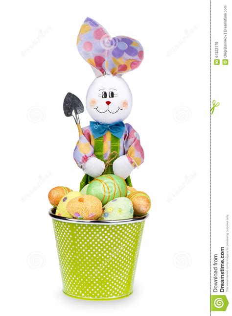 Easter Bunny With Colored Eggs In The Basket Isolated Stock Image