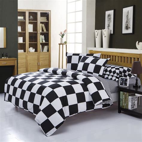 The set features a white geometric pattern, and the fabrics are made from cozy microfiber. Luxury Bedding Black White Queen Comforter Sets Bedding ...